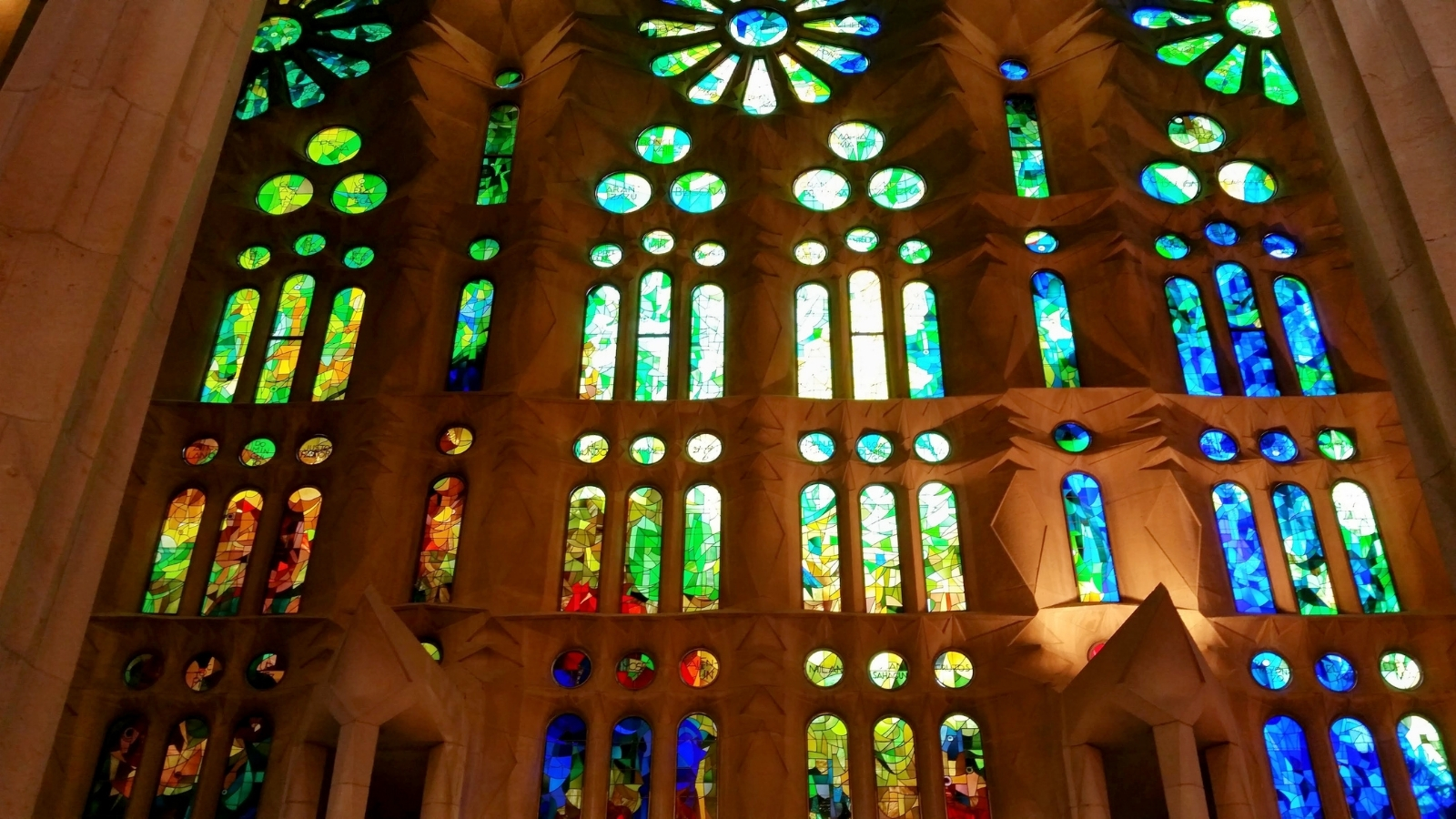 Sun shining through the Stain Glass Windows Sagrada Familia 2015 Barcelona Photo Credit Margarita Ibbott 2