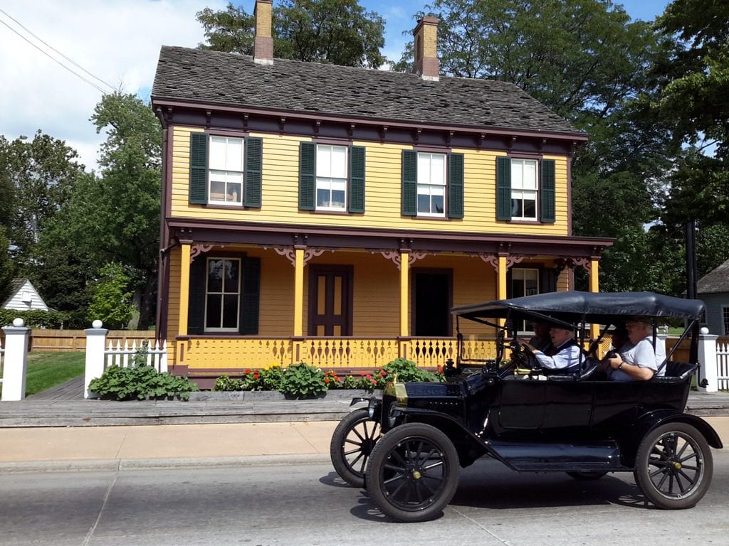Itinerary for Inter-generational Travel To Greenfield Village and The Henry Ford 3 Driving around in vintage Model-T Ford cars in Greenfield Village, Michigan