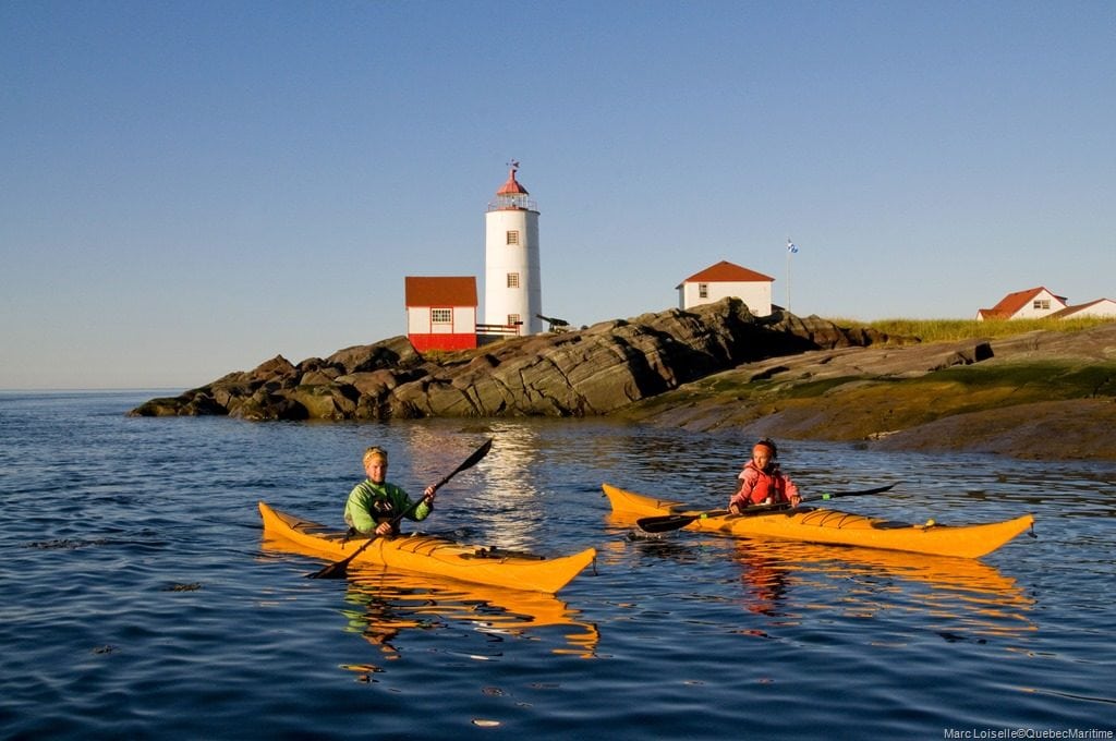 Kayakers with the le Verte Lighthouse in the background Photo Credit Marc Loiselle Bas Saint Lau