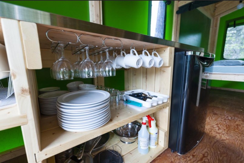 10+ Quirky & Unique Accommodations in Quebec Maritime 5 Ready to Camp Tombolo parc national du bic Quebec Maritime kitchen
