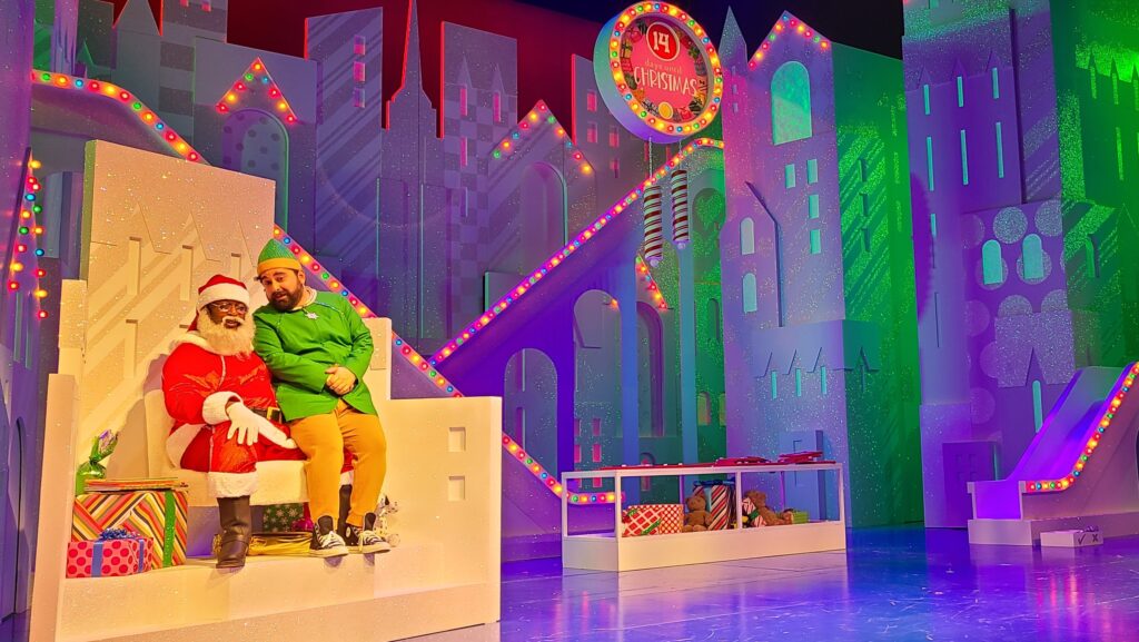 The Grand Theatre’s production of Elf: The Musical! 4 Elf - The Musical at the Grand Theatre in 2022 with Aadin Church (Santa) and Izad Etemadi (Buddy)