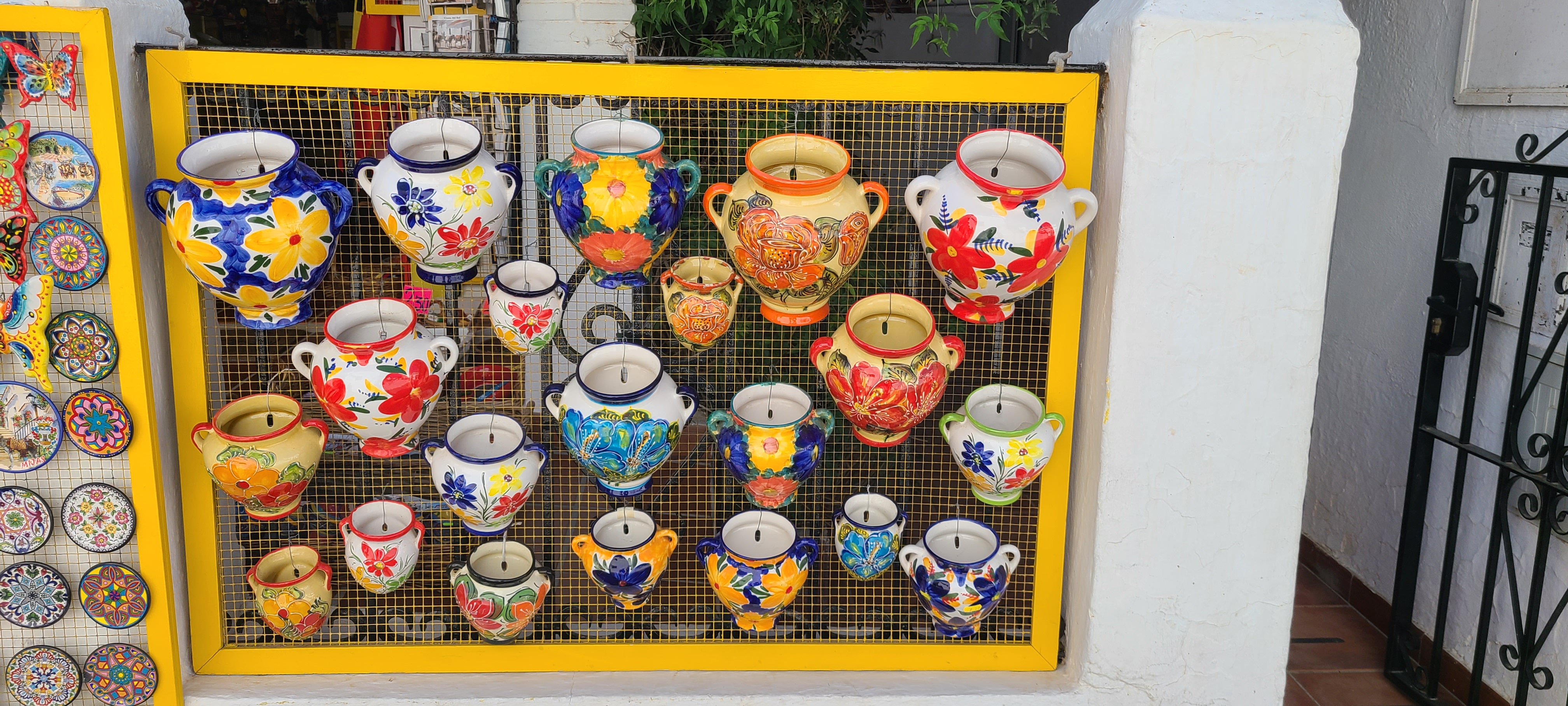 Quaint Pueblos Blancos in Southern Spain - Visiting Mijas 9 Colourful pottery is easy to buy when you are visiting Mijas, Spain in the Costa Del Sol