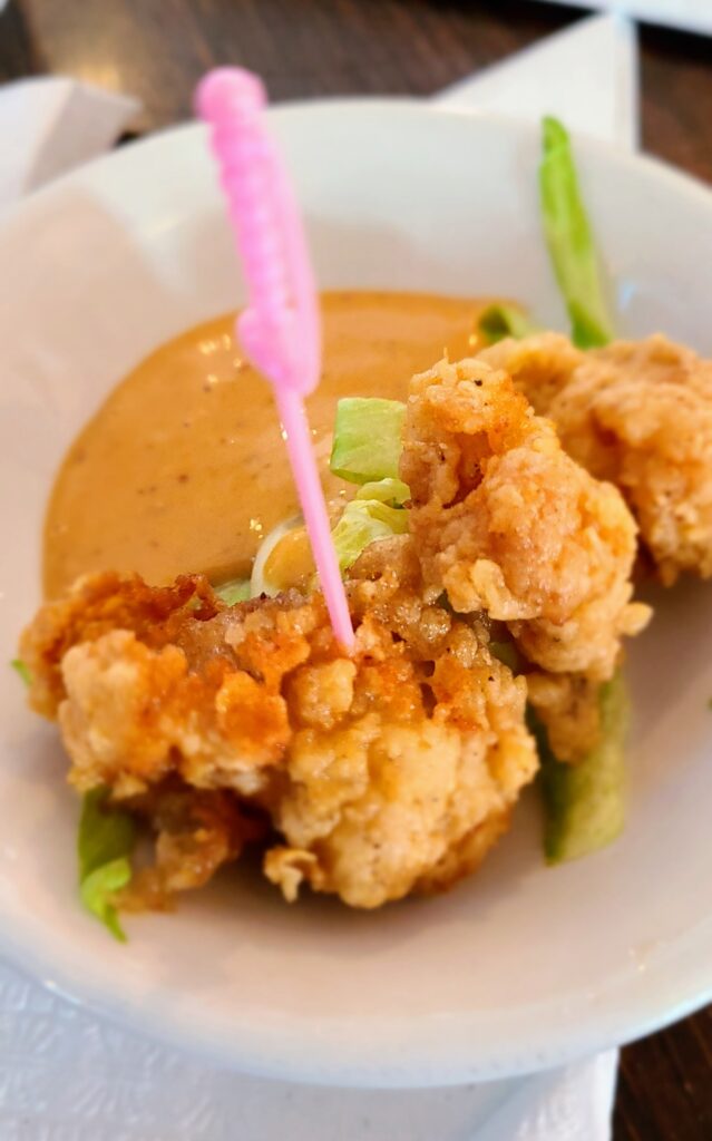 7 Unique Experiences in New Orleans - Food, Beverage and Art 23 Gator bites on the Destination Kitchen Food Tour