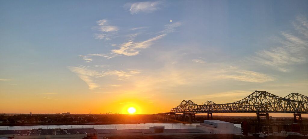 7 Unique Experiences in New Orleans - Food, Beverage and Art 2 Sunrise over the Mississippi River = 7 Unique Experiences in New Orleans