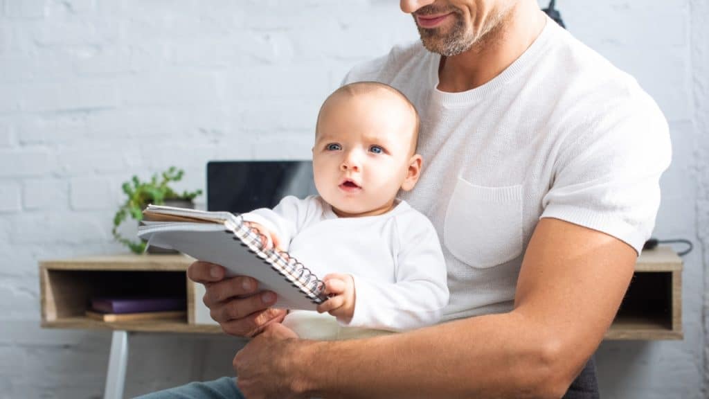 15 Great Ideas on How to Plan a Stress-Free Family Vacation 7 Baby with Dad Photo Credit VitalikRadko via Depositphotos