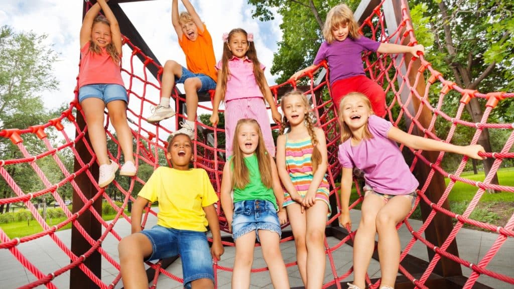 15 Great Ideas on How to Plan a Stress-Free Family Vacation 10 Childreen Playing Photo Credit serrnovik via Depositphotos