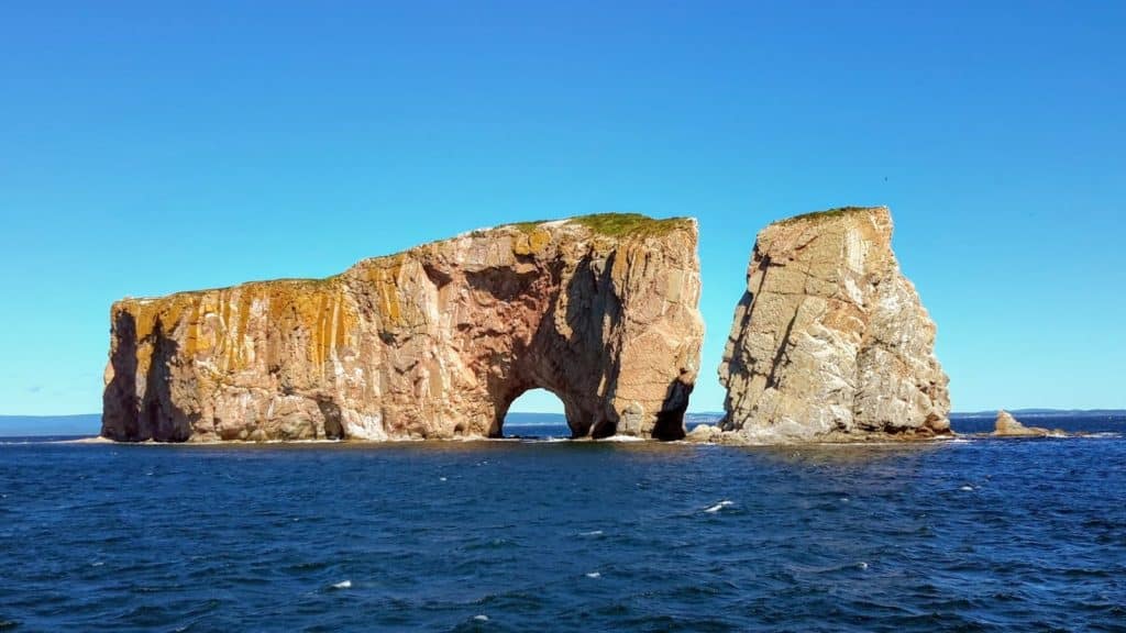 Explore Canada for Less: Free Admission, Camping Discounts, and VIA Rail Savings with the Canada Strong Pass 2025 2 Places to Visit in Canada - Perce Rock - Quebec Maritime Photo Credit Margarita Ibbott