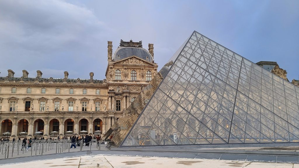 The Louvre at night Paris Photo Credit Margarita Ibbott 2