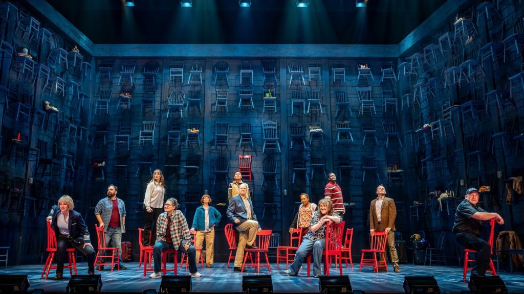 London's Come From Away: Red Chairs & Real Stories - Book Before May 31 Sellout 4 Ensemble Come From Away Grand Theatre Photo Credit Dahlia Katz via The Grand Theatre