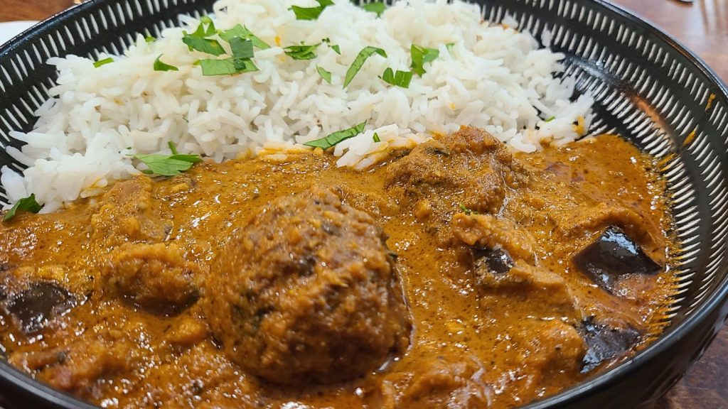 Where to Eat Like a Local in Paris: A Guide to Bouillon Bistros 12 Curry dish at Bouillon de L'ile - Paris, France